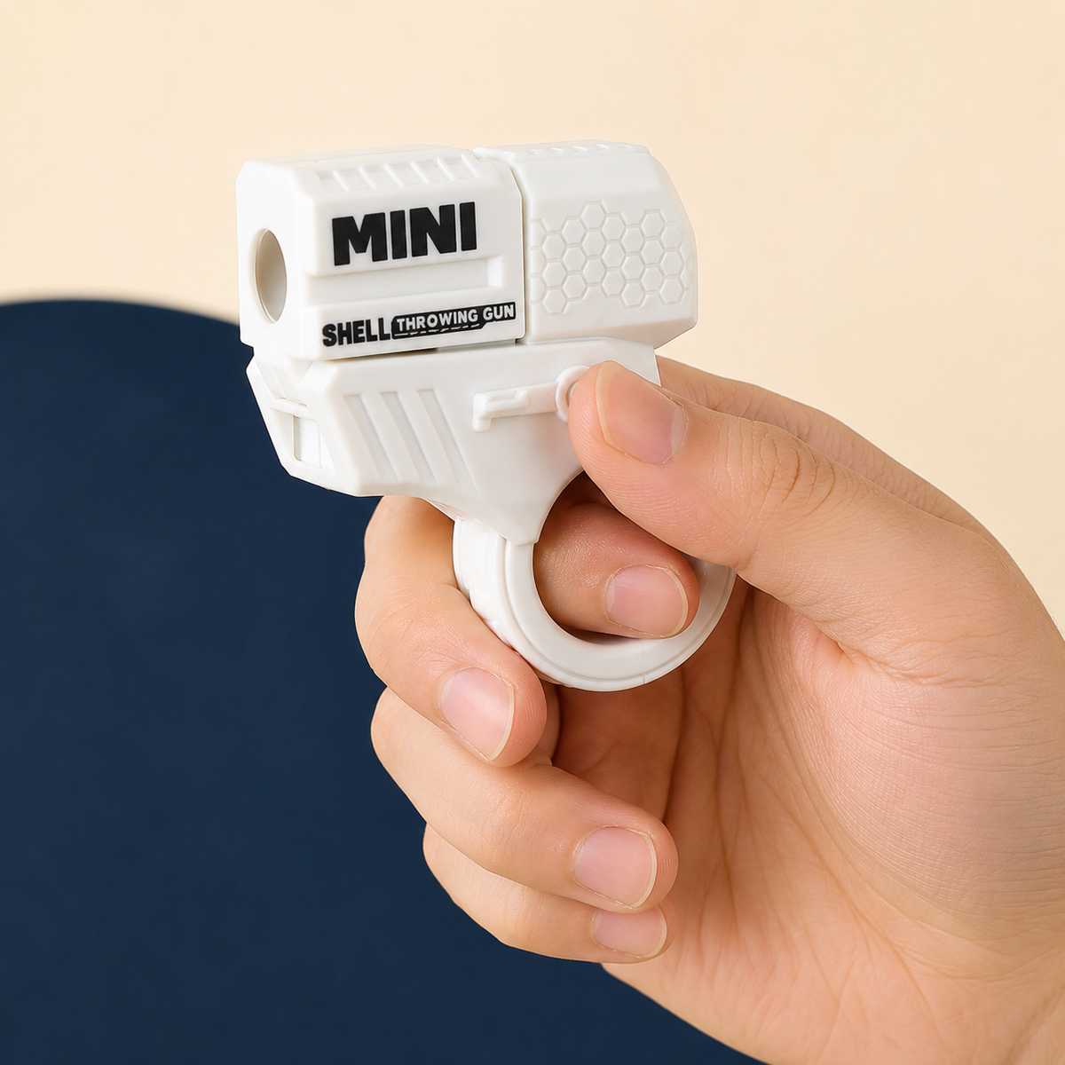 Mini ring blaster showing its shell-ejecting loading action