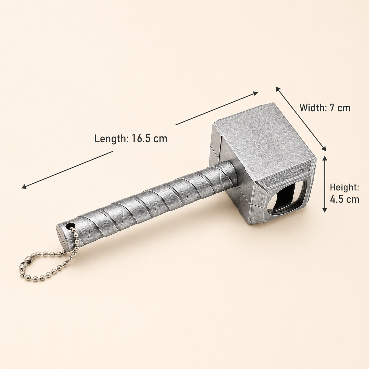 A silver-colored miniature hammer keychain shown on a light beige background with black dimension arrows and text indicating its length, width, and height.